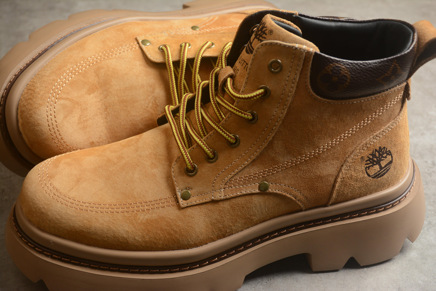 Yellow LV-style Timberland-Inspired boots.